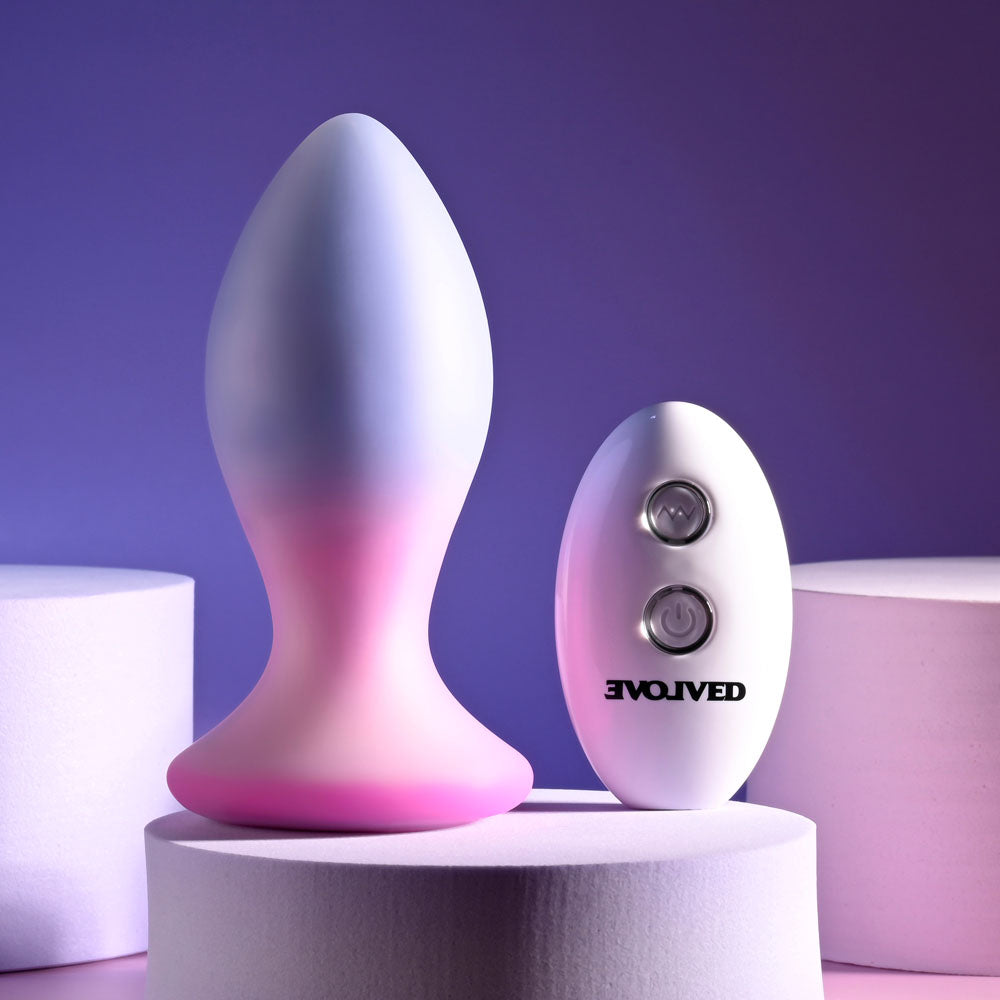 Evolved PARADISE PLUG - Pink/Purple 10.5 cm USB Rechargeable Vibrating Butt Plug with Wireless Remote on display.