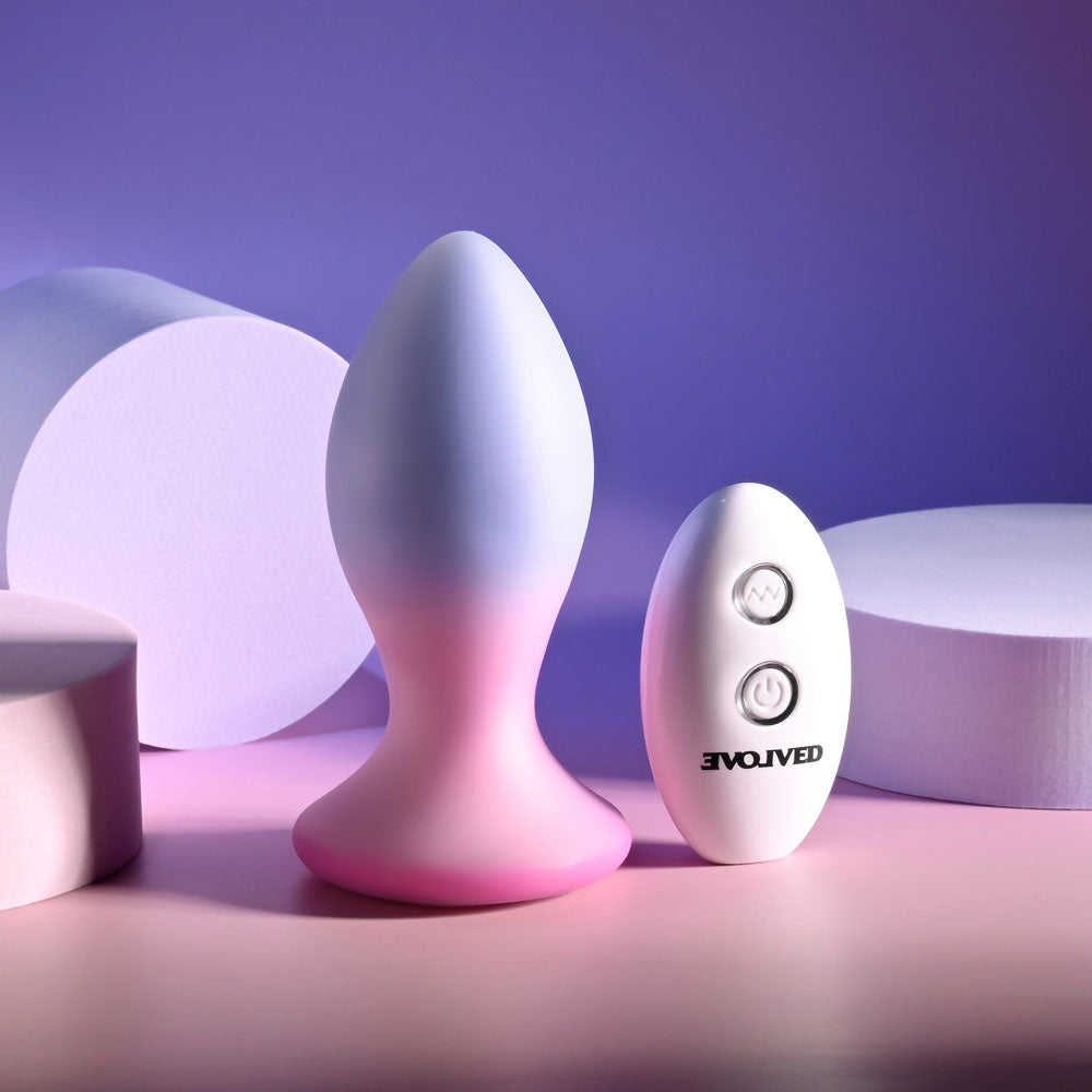 Evolved PARADISE PLUG - Pink/Purple 10.5 cm USB Rechargeable Vibrating Butt Plug with Wireless Remote on display.