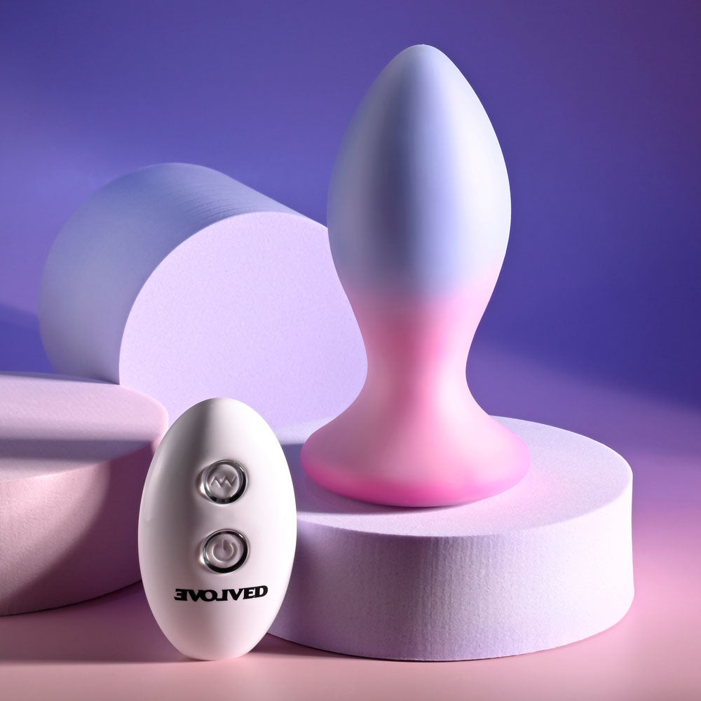 Evolved PARADISE PLUG - Pink/Purple 10.5 cm USB Rechargeable Vibrating Butt Plug with Wireless Remote on display.