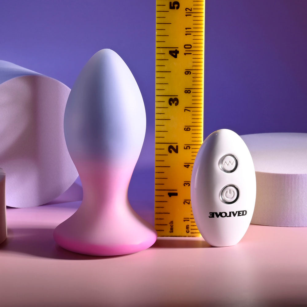 Evolved PARADISE PLUG - Pink/Purple 10.5 cm USB Rechargeable Vibrating Butt Plug with Wireless Remote next to a ruler.