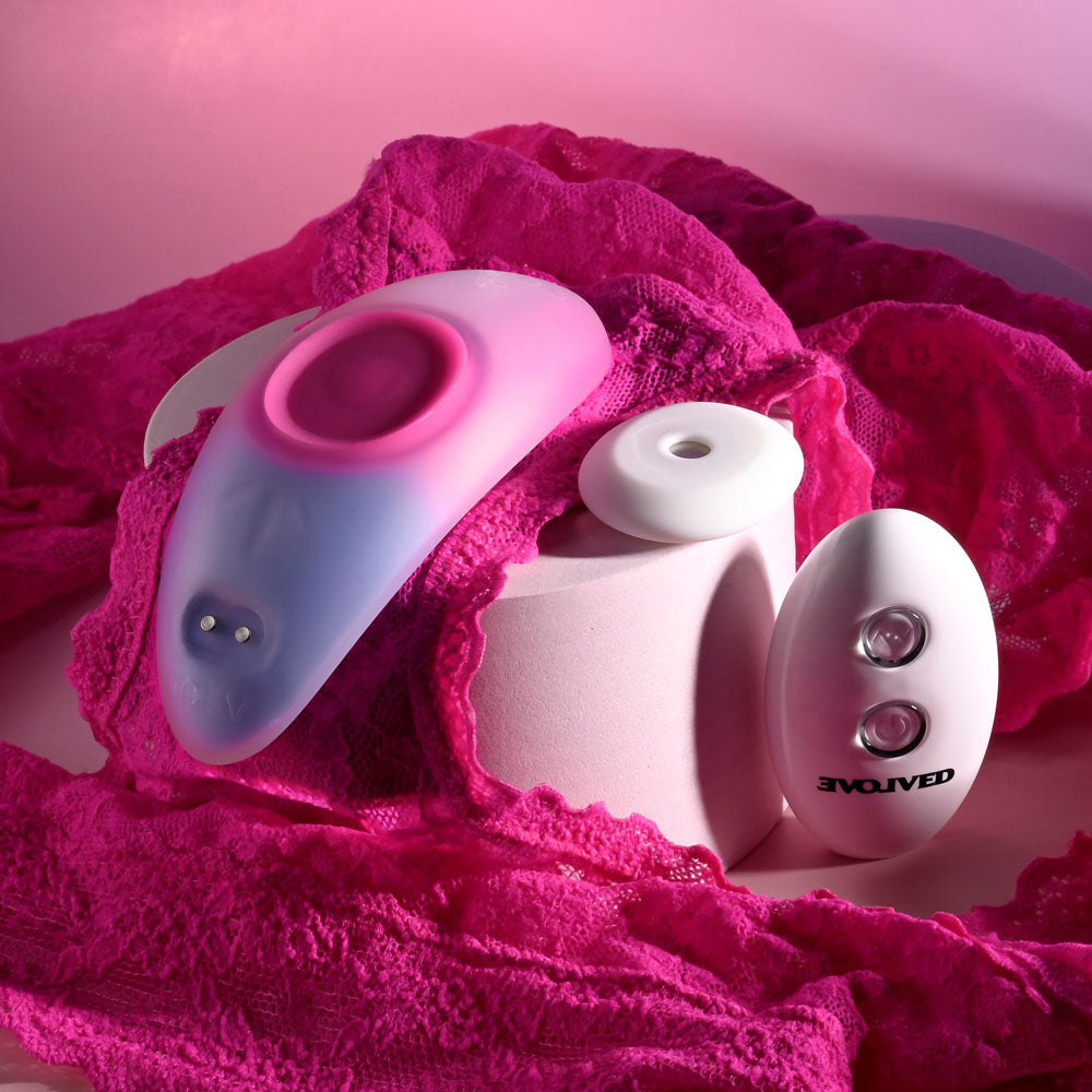 Evolved PARADISE PANTY - Pink/Purple USB Rechargeable Panty Vibrator with Remote Control on pink lace.