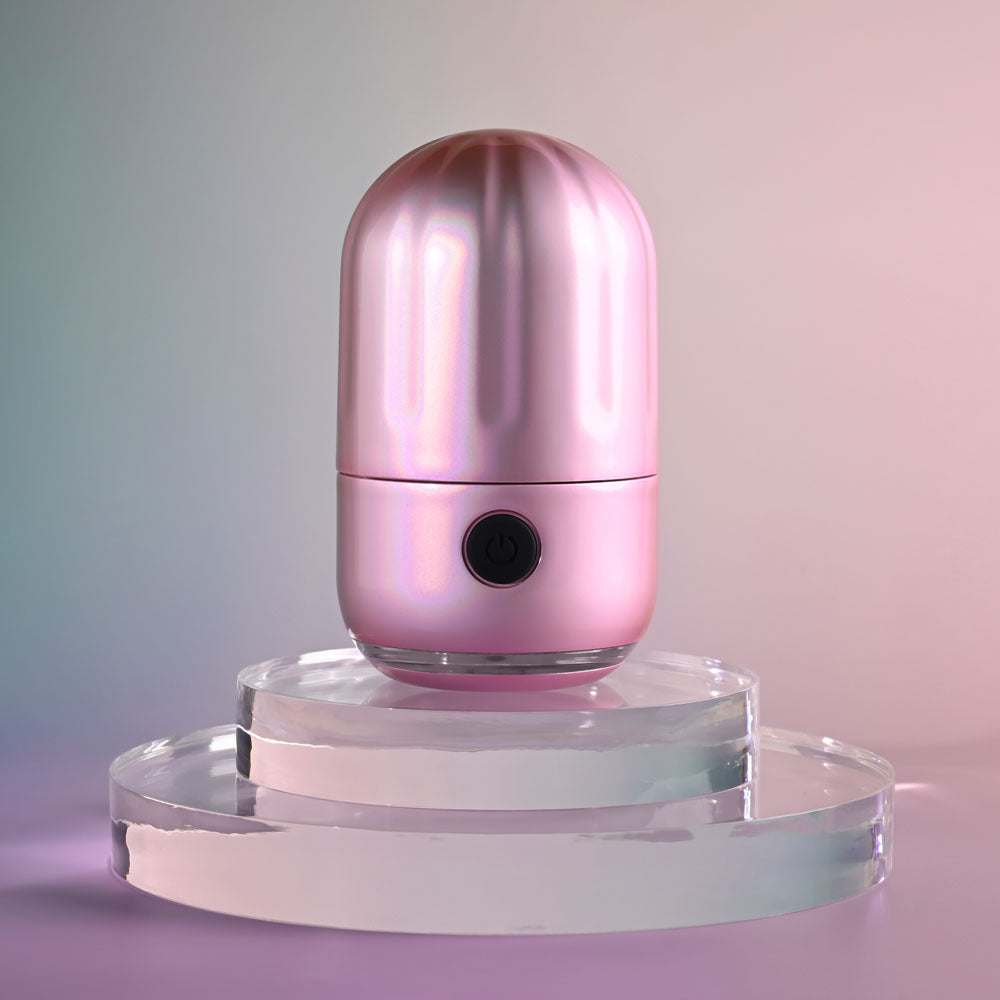 Evolved VACATION VIBES - VIBRATING - /Black 8.5 cm USB Rechargeable Vibrating Stimulator on a display