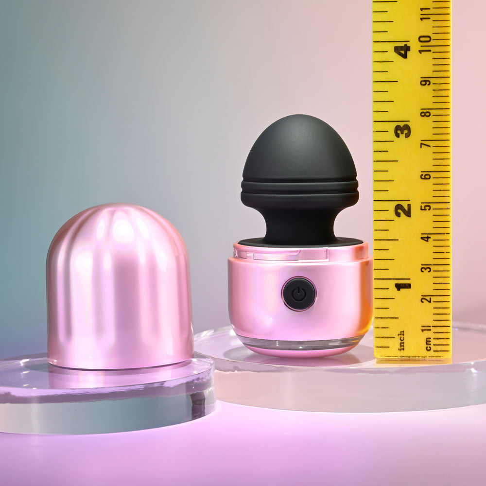 Evolved VACATION VIBES - VIBRATING - /Black 8.5 cm USB Rechargeable Vibrating Stimulator next to a ruler for size comparison.