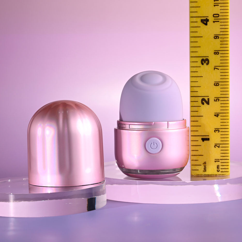 Evolved VACATION VIBES - TAPPING -  8.5 cm USB Rechargeable Tapping Stimulator on display with a ruler for size reference.