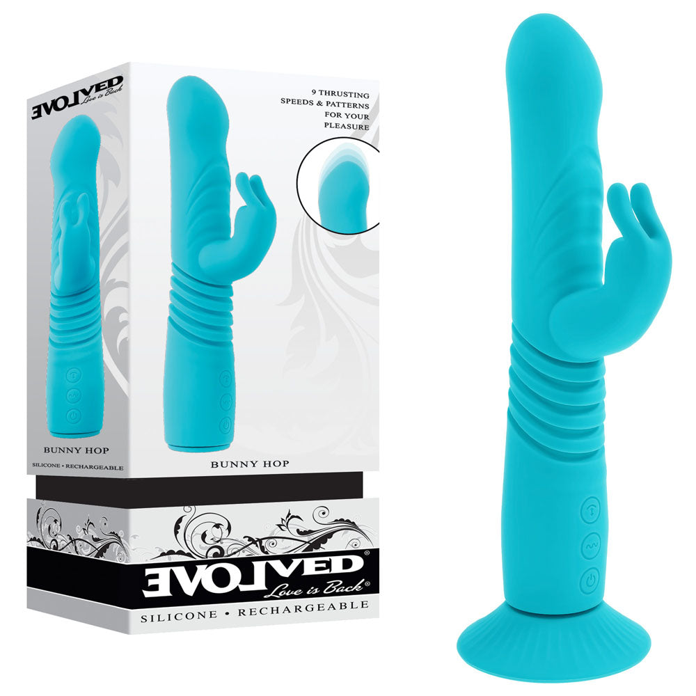 Evolved BUNNY HOP - Teal 25.1 cm USB Rechargeable Thrusting Rabbit Vibrator with Suction Base next to its packaging.