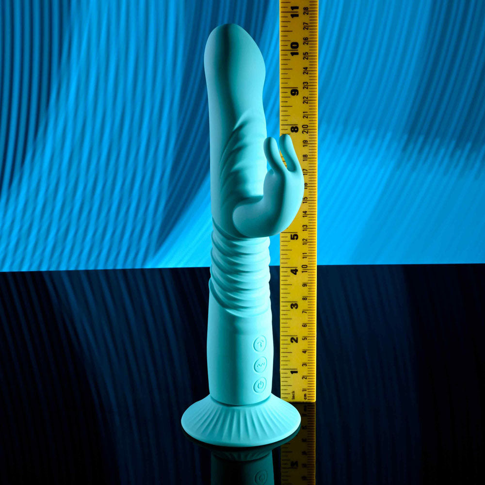 Evolved BUNNY HOP - Teal 25.1 cm USB Rechargeable Thrusting Rabbit Vibrator with Suction Base next to a ruler.