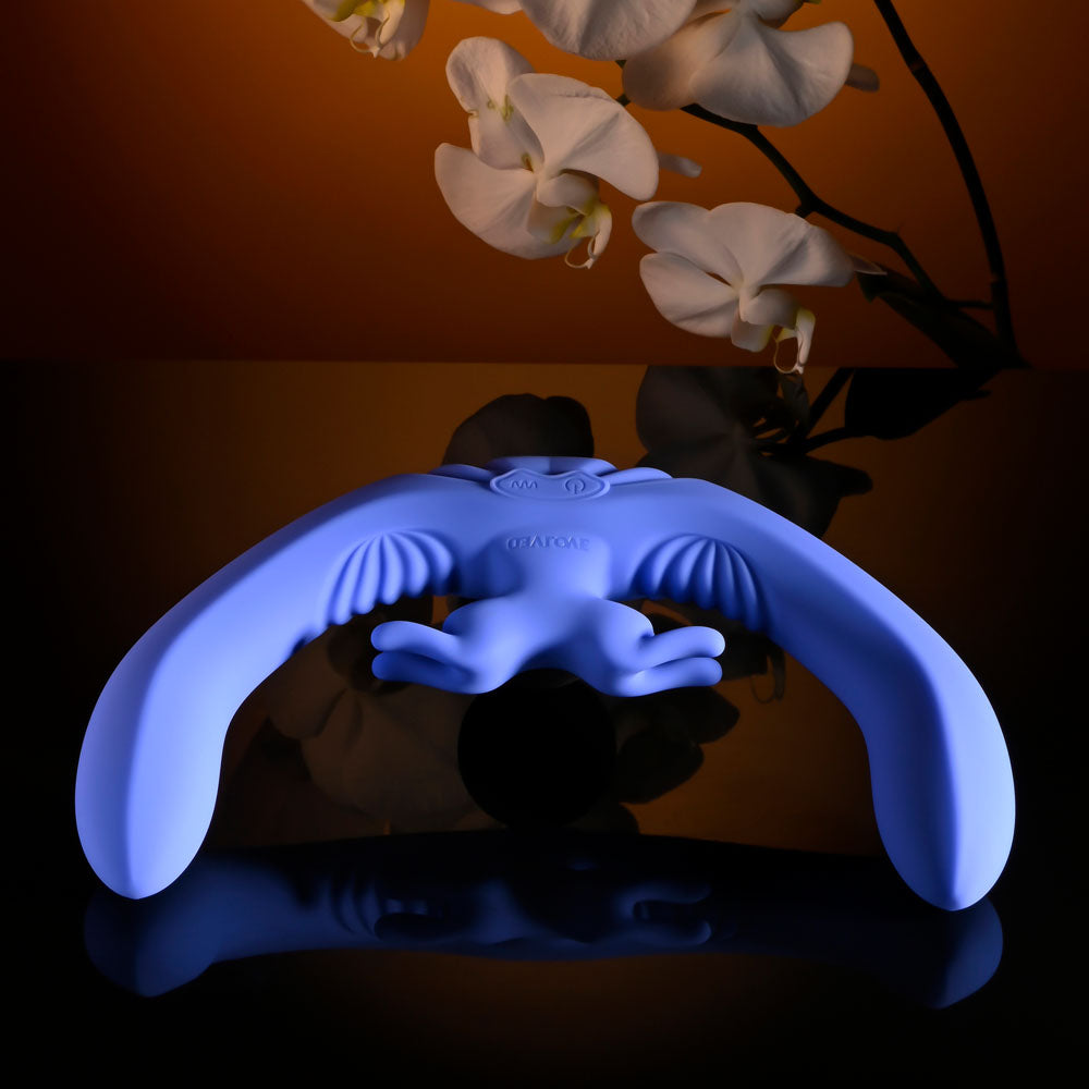 Evolved LOVEBIRDS - 20.8 cm USB Rechargeable Double-Ended Rabbit Vibrator with Remote against an elegant background.