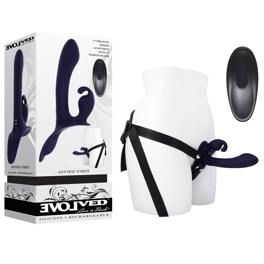 Evolved GIVING VIBES - 14.6 cm USB rechargeable vibrating strap-on with remote on a mannequin with adjustable harness.