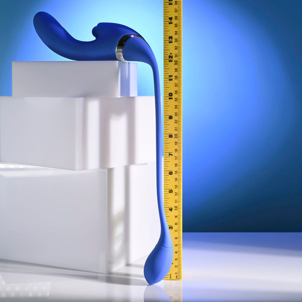 Evolved ALL IN -  USB Recahrgeable Triple Stimulating Vibrator displayed next to a measuring tape against a blue background.