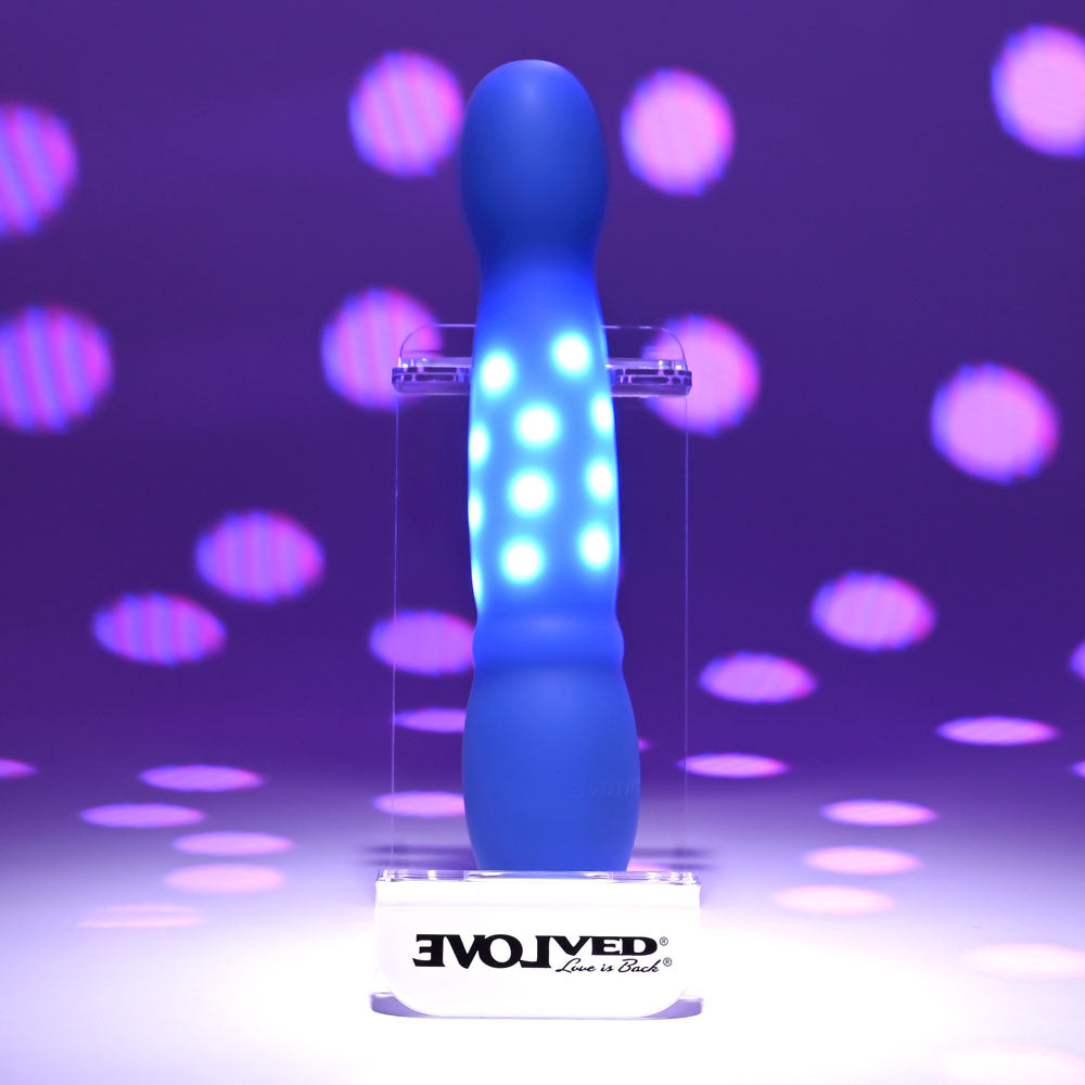 Evolved DISCO DIVA -  20.9 cm USB Rechargeable Light Up Vibrator displayed with vibrant lights in the background.