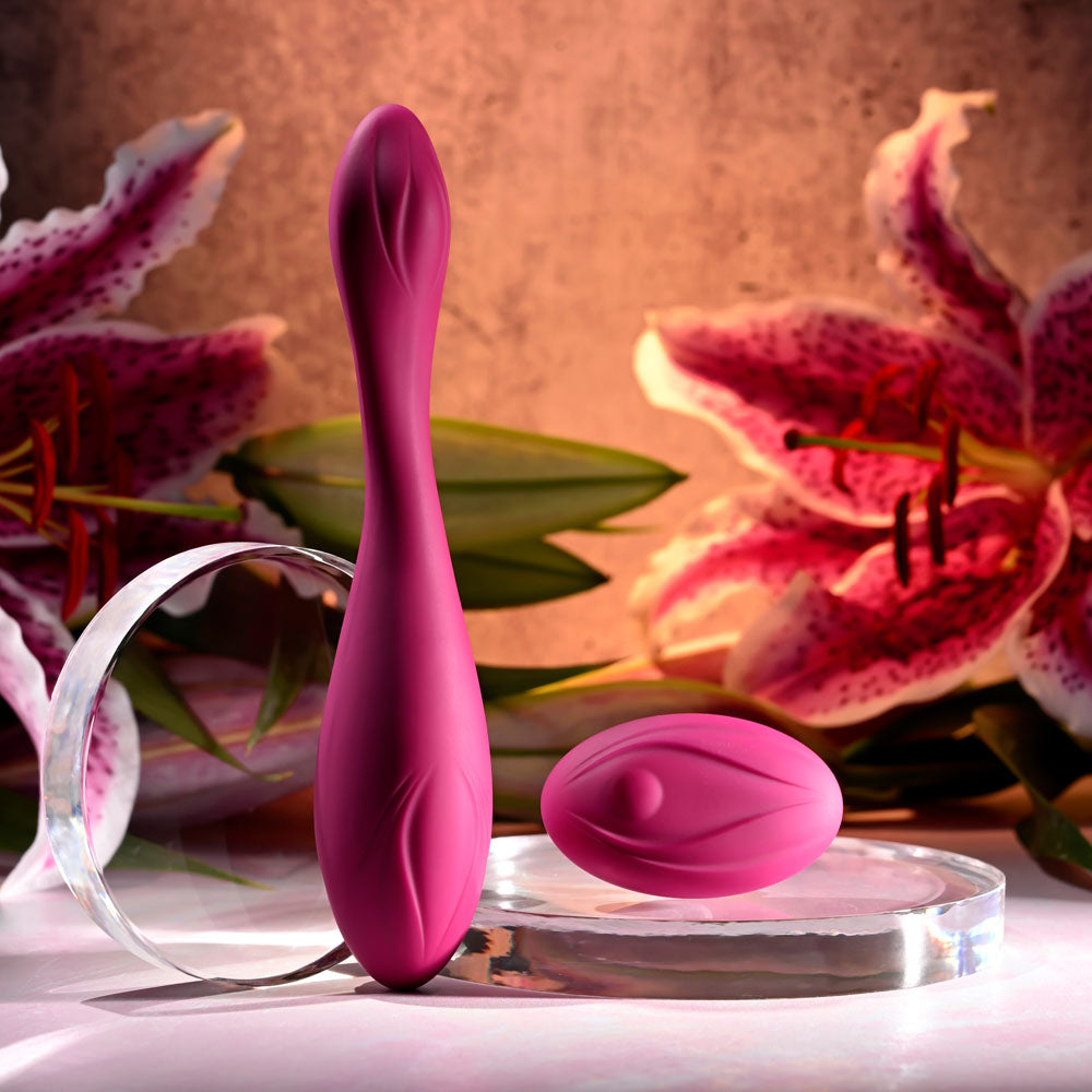Evolved CHERRY POSE - 16.1 cm USB Rechargeable Flexible & Posable Vibrator with Remote alongside a textured pleasure egg.