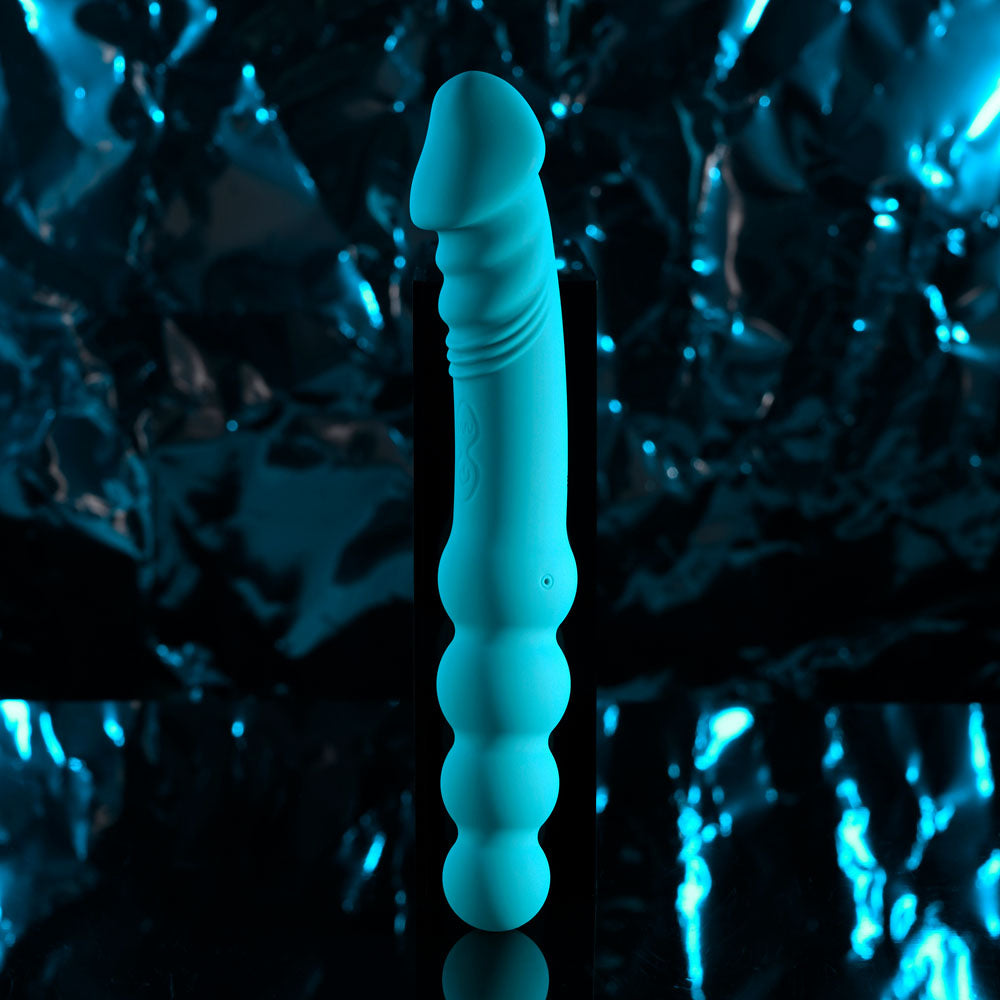 Evolved FLIP FLOP -  23.1 cm USB Rechargeable Dual Ended Vibrator against a reflective background.