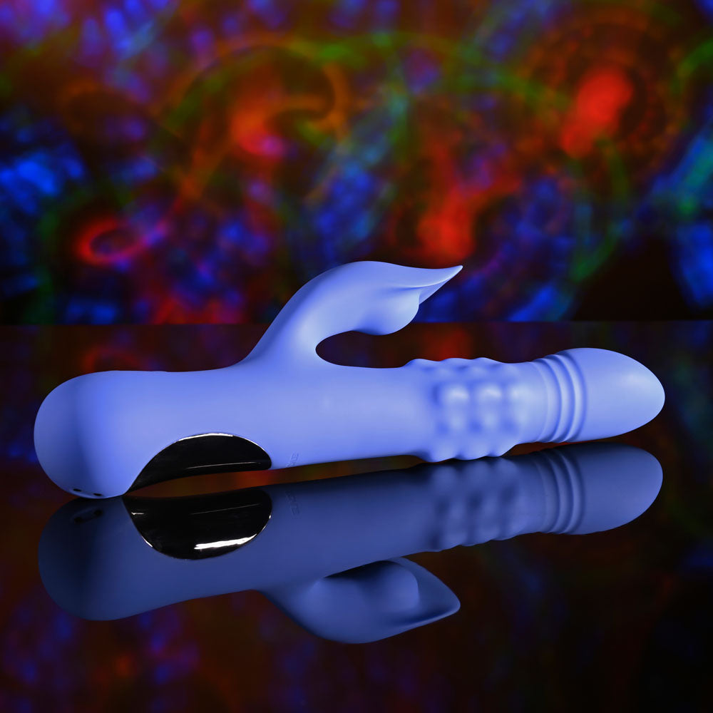 Evolved POP GOES THE O -  24.7 cm USB Rechargeable Thrusting & Bulging Rabbit Vibrator on a reflective surface.