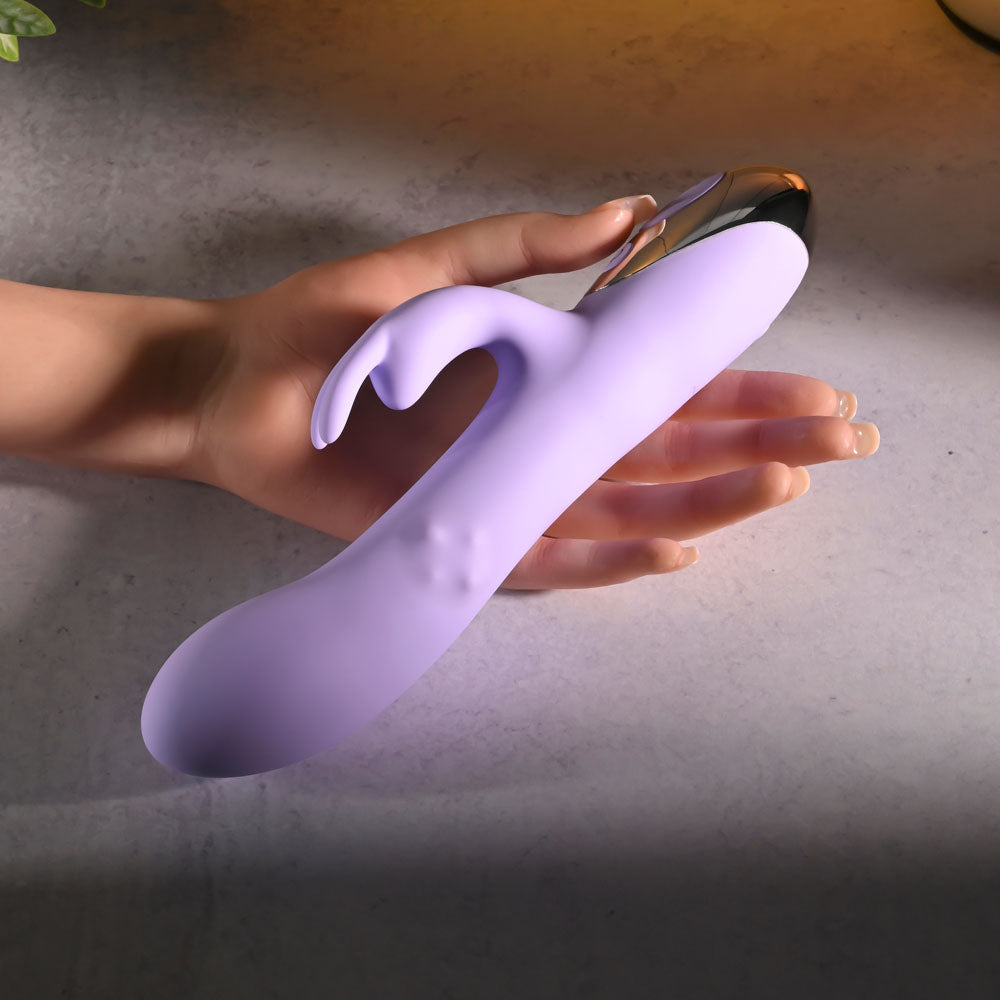 Evolved SPINDERELLA - USB Rechargeable Rabbit Vibrator in a hand, showcasing its sleek design and dual vibe features.