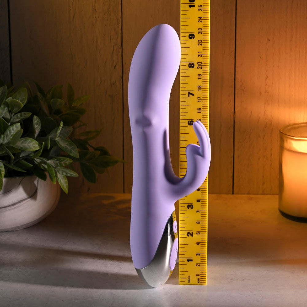 Evolved SPINDERELLA - USB Rechargeable Rabbit Vibrator next to a ruler for size comparison, with soft purple silicone finish.