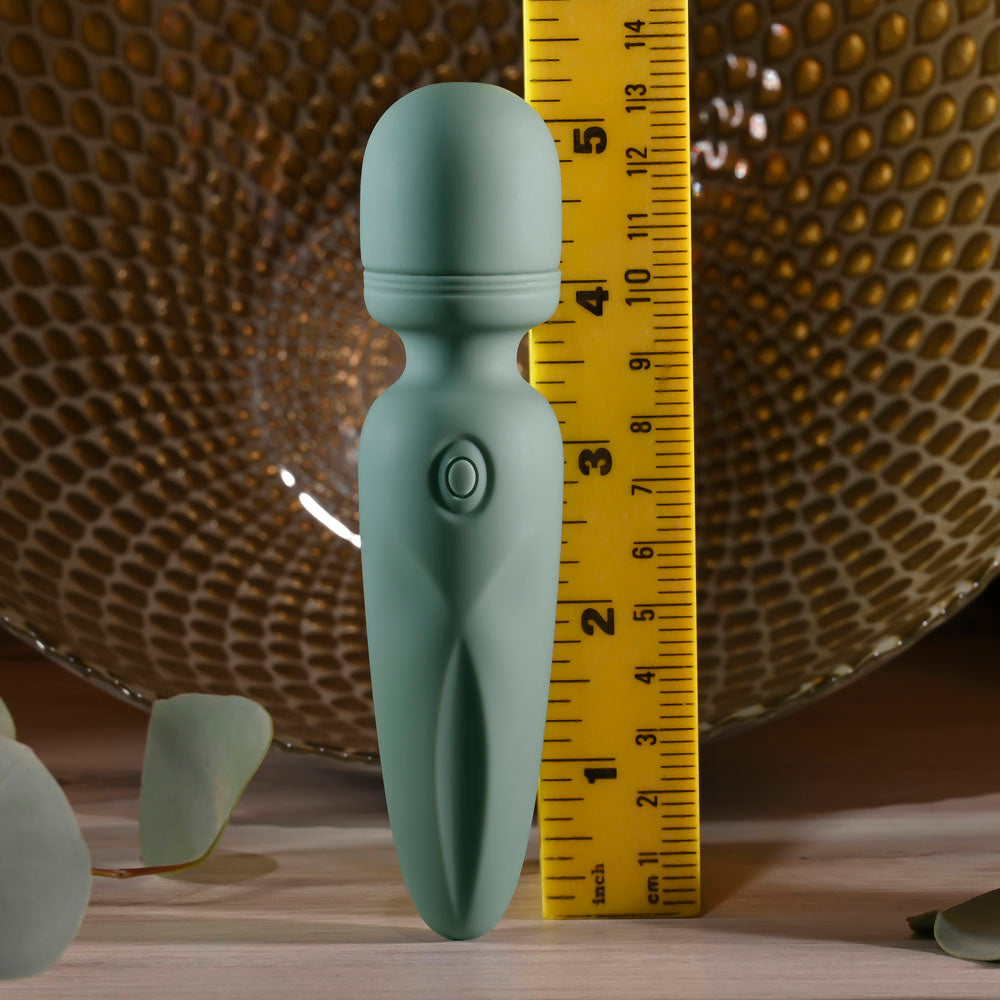 Evolved RUMBLE WAND - Olive  13.4 USB Rechargeable Mini Massage Wand alongside a ruler for size reference.