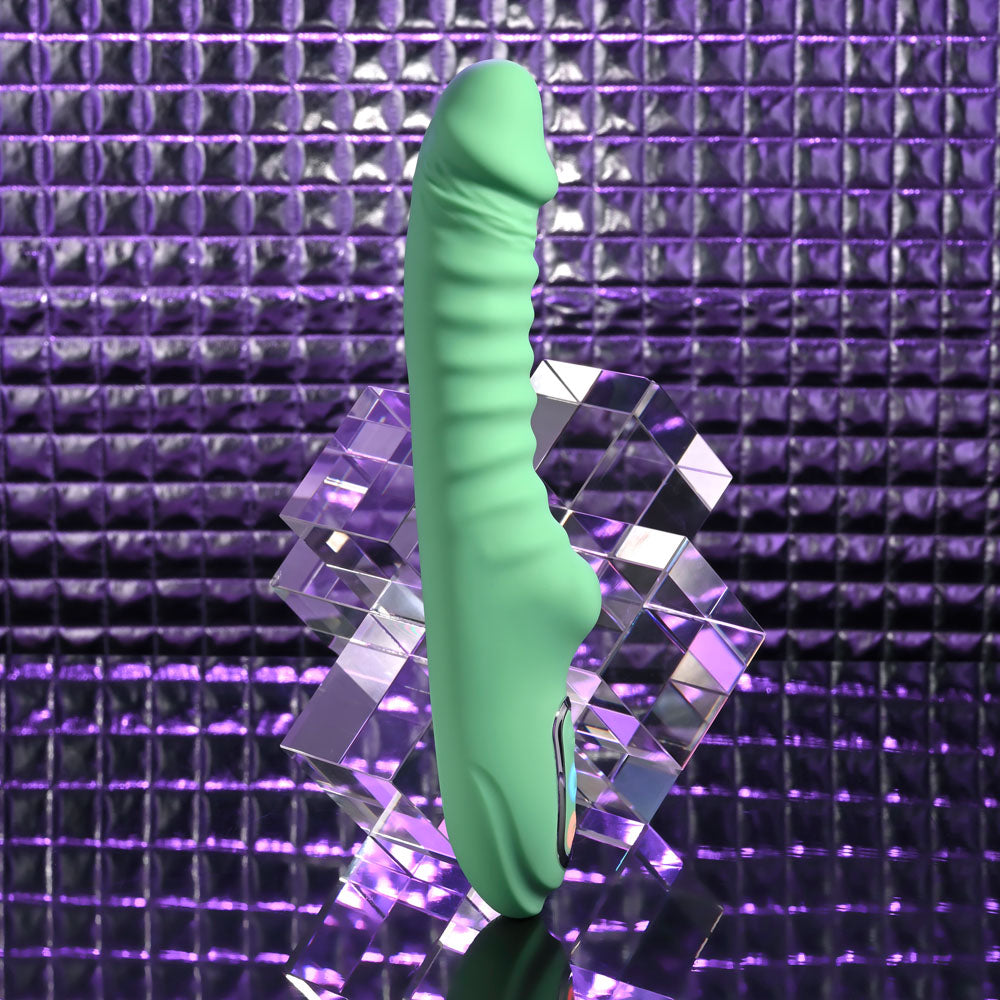 Evolved FULL THROTTLE - Mint 24.1 cm USB Rechargeable Vibrator on crystal display, showcasing ribbed texture and curved design.