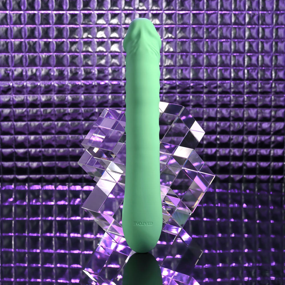 Evolved FULL THROTTLE - Mint 24.1 cm USB Rechargeable Vibrator on a reflective surface, showcasing its sleek design.