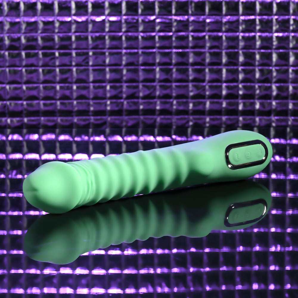 Evolved FULL THROTTLE - Mint 24.1 cm USB Rechargeable Vibrator on a reflective surface with textured green finish.