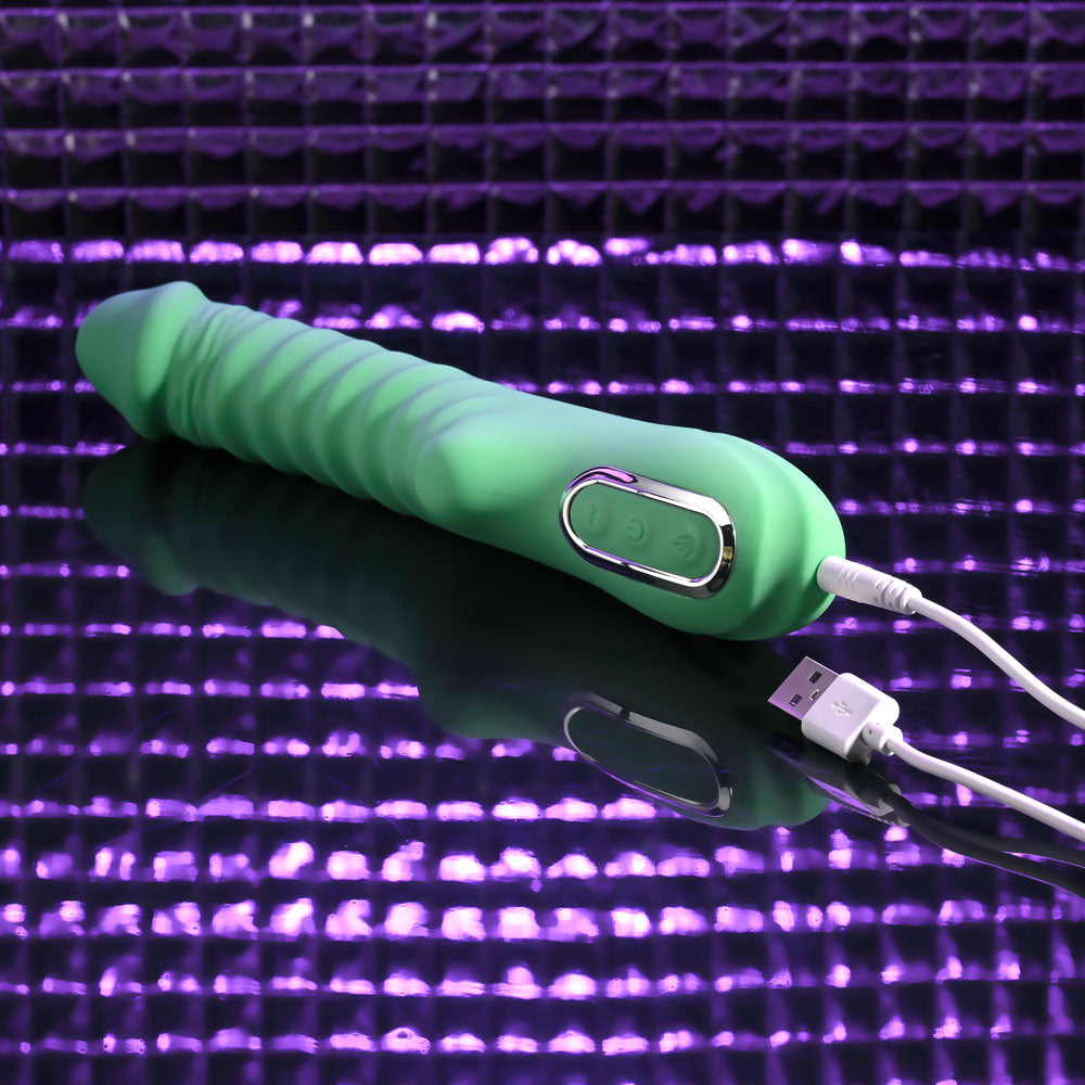 Evolved FULL THROTTLE - Mint 24.1 cm USB Rechargeable Vibrator showcasing its ribbed design and USB charging port.