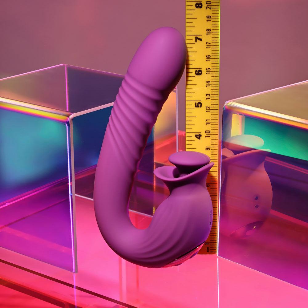 Evolved DEEP ECSTASY - 16.5 cm USB Rechargeable Thrusting and Tapping Vibrator next to a ruler for size reference.