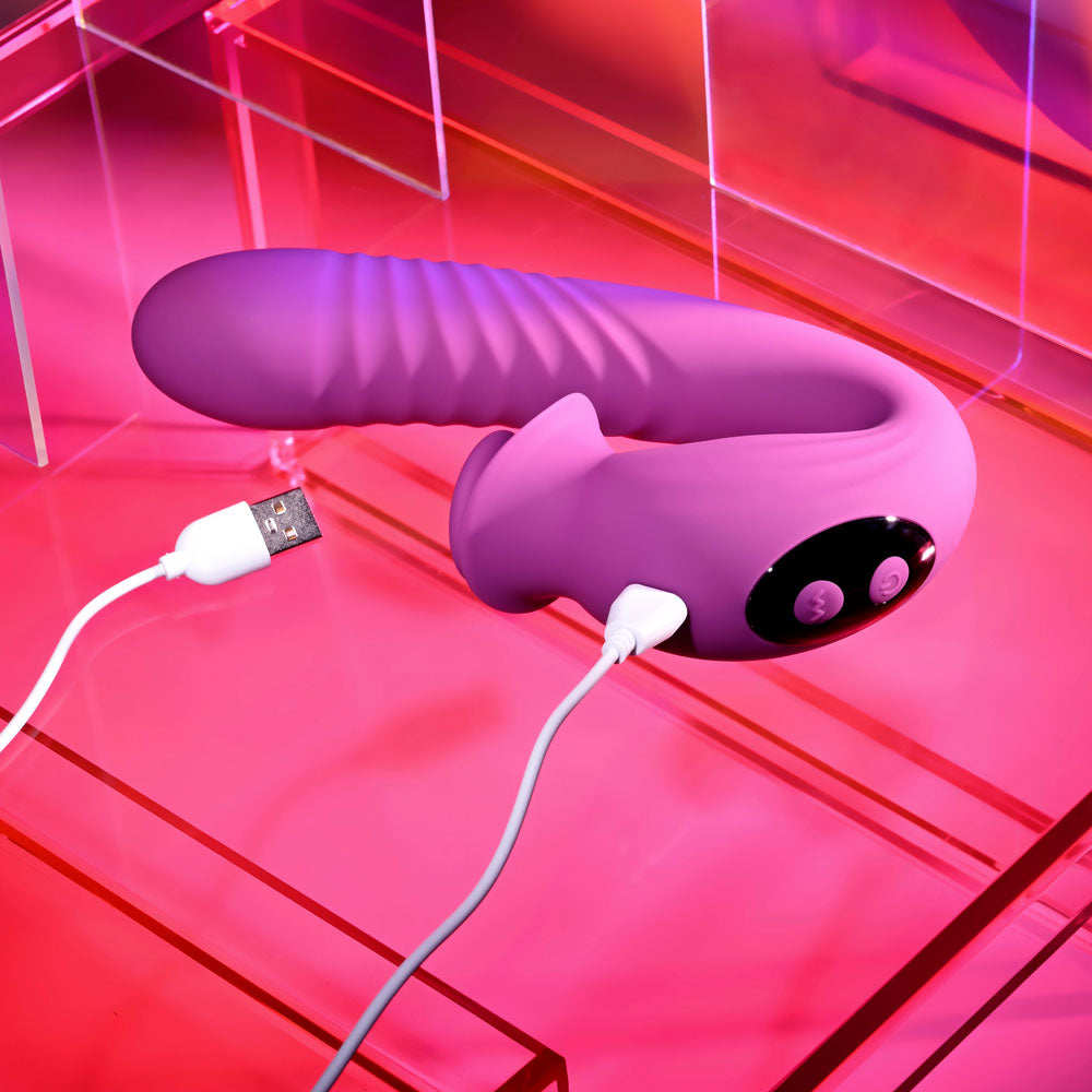 Evolved DEEP ECSTASY - 16.5 cm USB Rechargeable Thrusting and Tapping Vibrator in vibrant purple with USB charging cable.