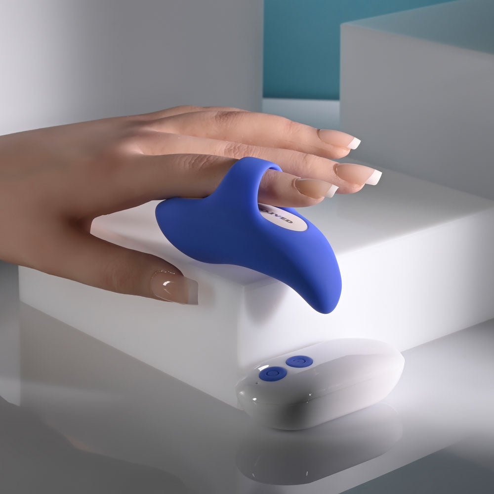 Evolved TAKE YOUR PICK - Rechargeable Bullet with 3 Interchangeable Sleeves held in hand, showcasing precision and play.
