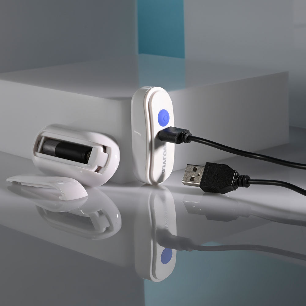 Evolved TAKE YOUR PICK - Rechargeable Bullet with 3 Interchangeable Sleeves on a sleek surface with charging cable.
