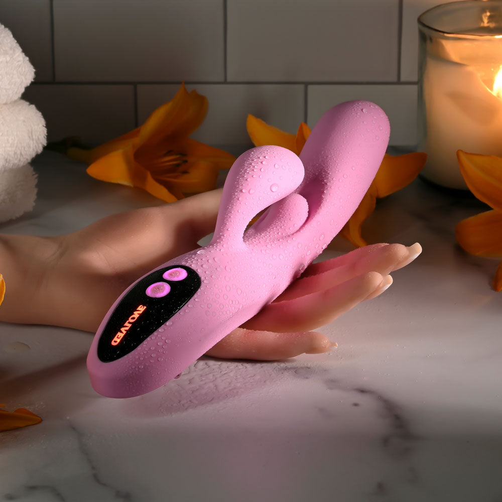 Evolved PUSH THE BUTTON - 23.5 cm USB Rechargeable Rabbit Vibrator with G-Spot Bud on a marble surface