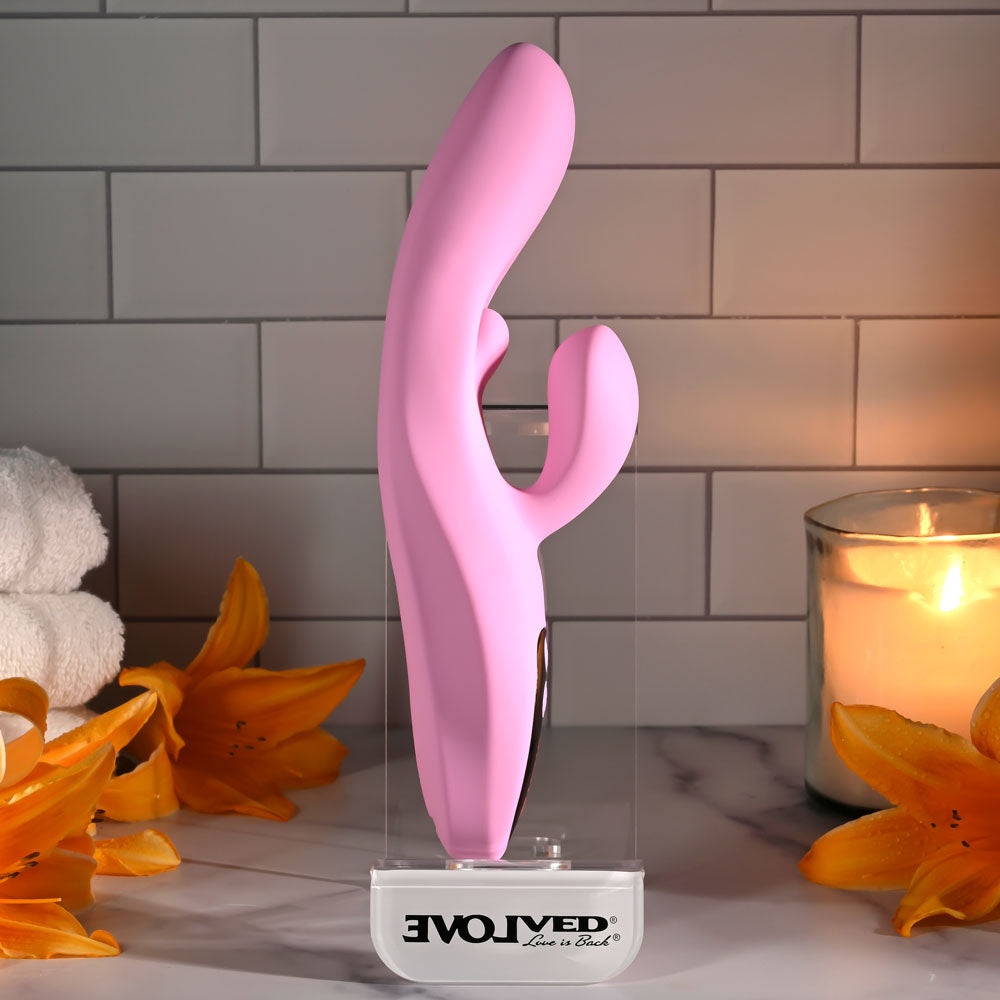 Evolved PUSH THE BUTTON -  23.5 cm USB Rechargeable Rabbit Vibrator with G-Spot Bud displayed with candles and flowers.