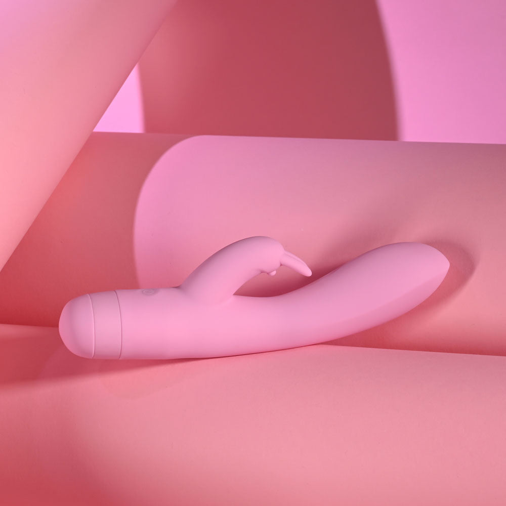 Evolved CUSHY BUNNY -  19.1 cm USB Rechargeable Rabbit Vibrator on soft pink background, perfect intimate essential for her.