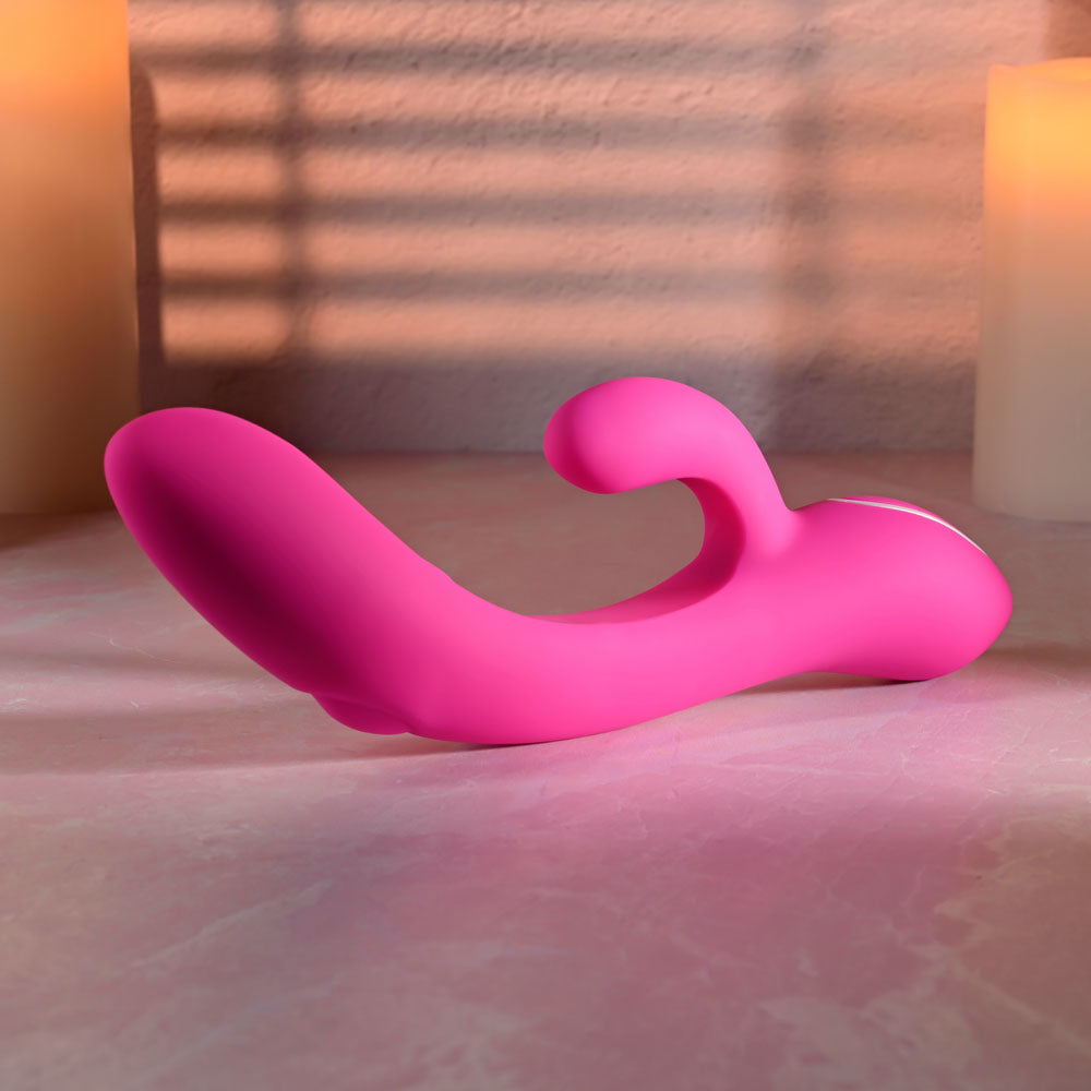 Evolved G-TAPPER -  USB Rechargeable Rabbit Vibrator in pink, showcasing its curved design for G-spot stimulation.
