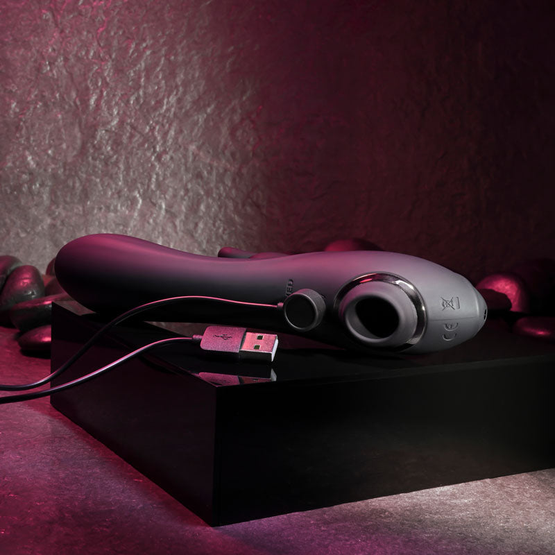 Evolved RABBIT HOLE - 21.2 cm USB Rechargeable Rabbit Vibrator charging on a sleek black surface.