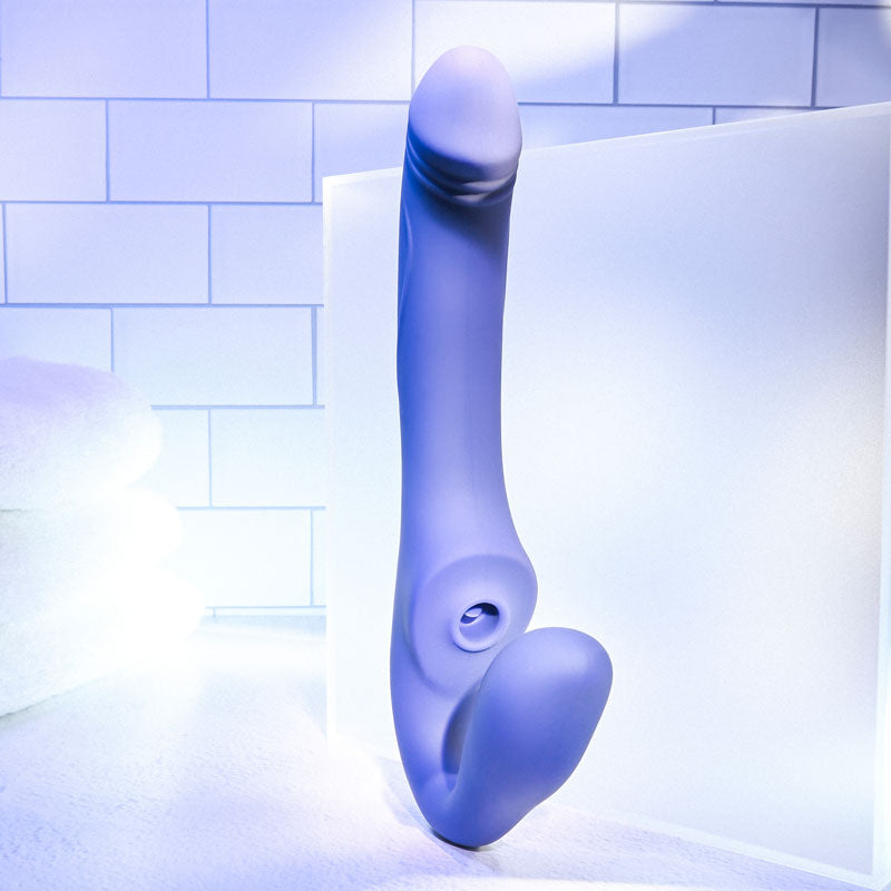Evolved 2 BECOME 1 -  23.5 cm USB Rechargeable Strapless Strap-On with Remote displayed in a modern setting.