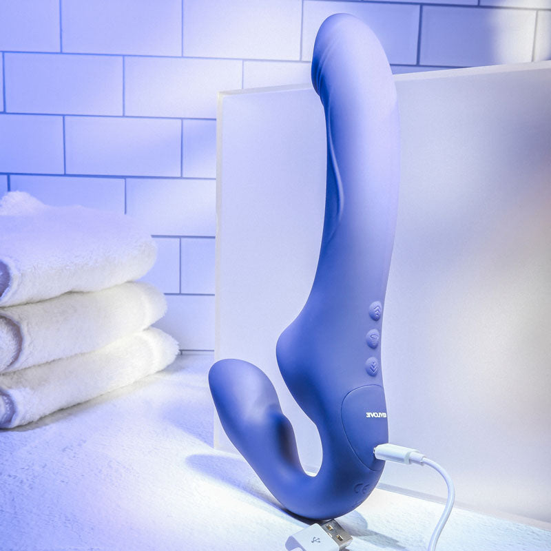 Evolved 2 BECOME 1 -  23.5 cm USB Rechargeable Strapless Strap-On with Remote showcasing its sleek design and charging feature.