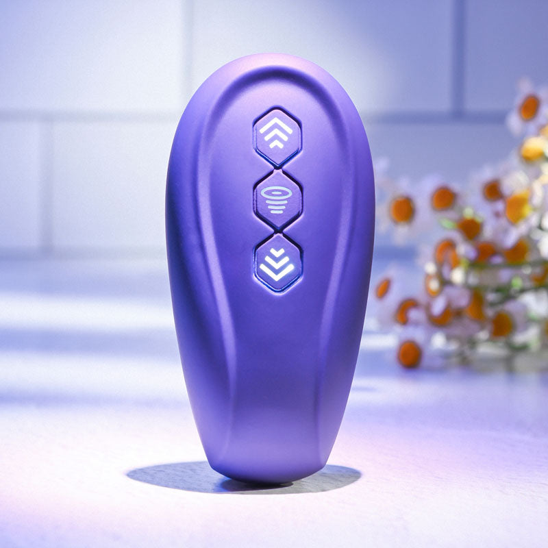 Evolved 2 BECOME 1 - 23.5 cm USB Rechargeable Strapless Strap-On with Remote in purple with control buttons.