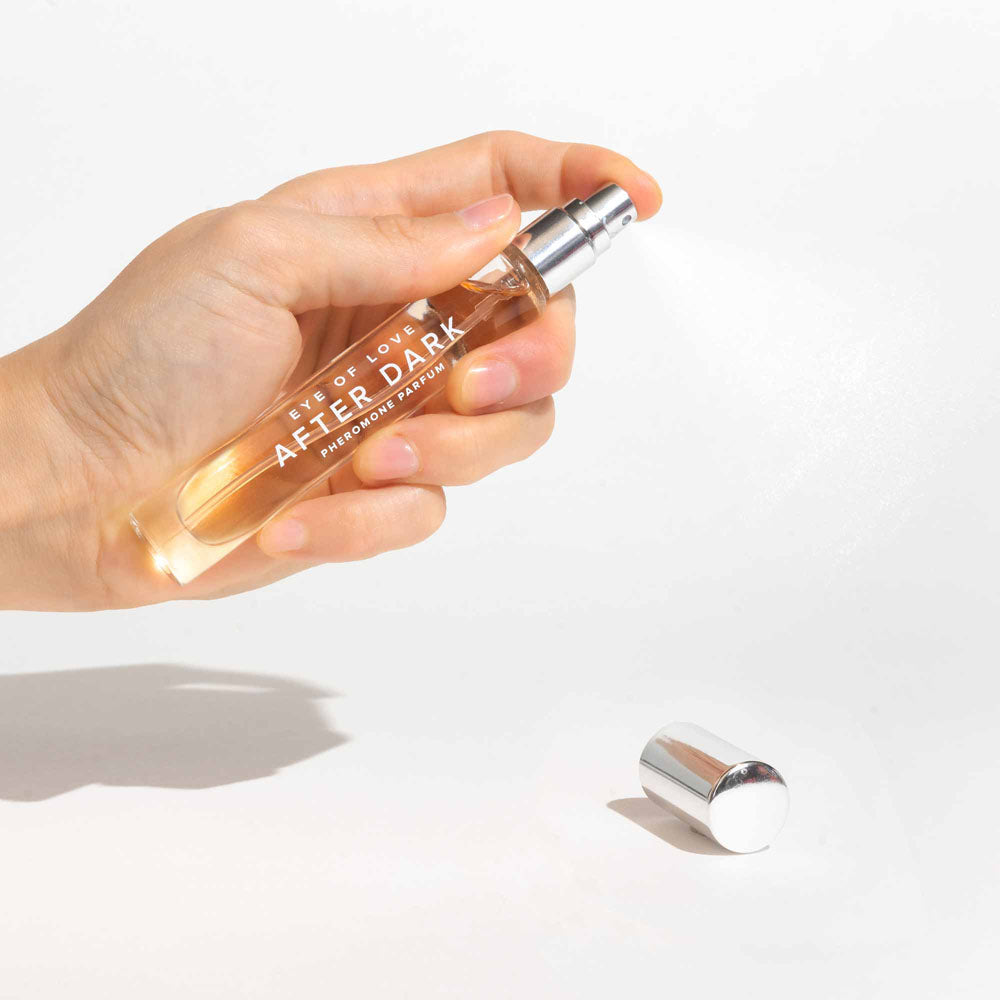 Eye Of Love After Dark Pheromone Perfume - 10 ml - Coco Vanilla Scented Pheromone Perfume for Women to attract Men - 10 ml Spray in hand.
