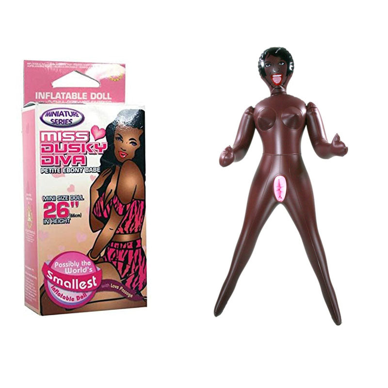 Miss Dusky Diva - Mini Inflatable Love Doll next to its packaging, showcasing the world's smallest inflatable doll.