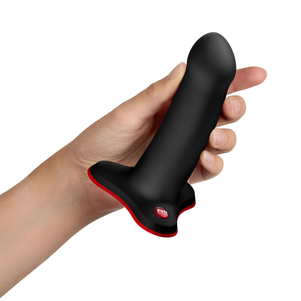 Fun Factory AMOR - 13.5 cm Dildo held in hand, designed for targeted G-spot and prostate stimulation.