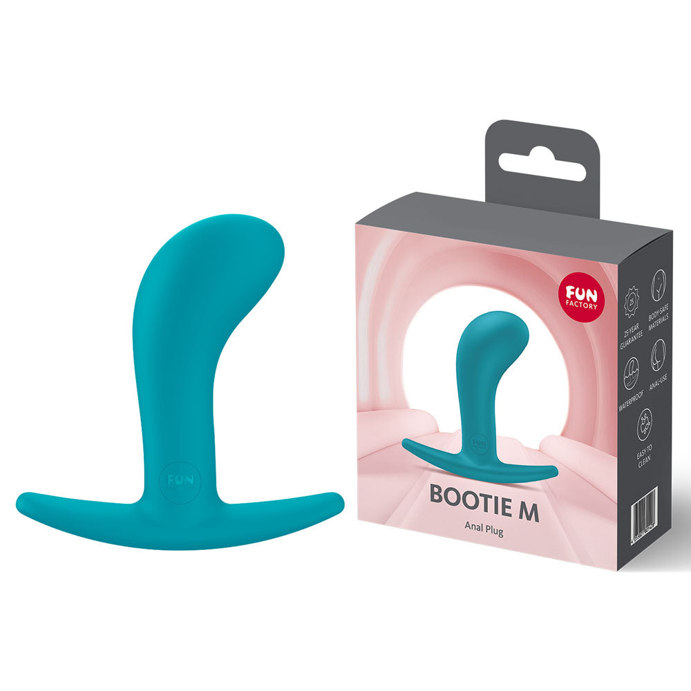 Fun Factory BOOTIE M Aquamarine - Aquamarine 9.4 cm Medium Butt Plug displayed with packaging.