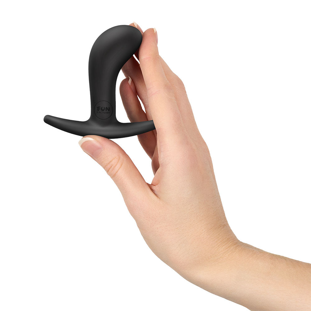 Fun Factory BOOTIE S - 7.9 cm Small Butt Plug in hand, showcasing its sleek design and compact size.