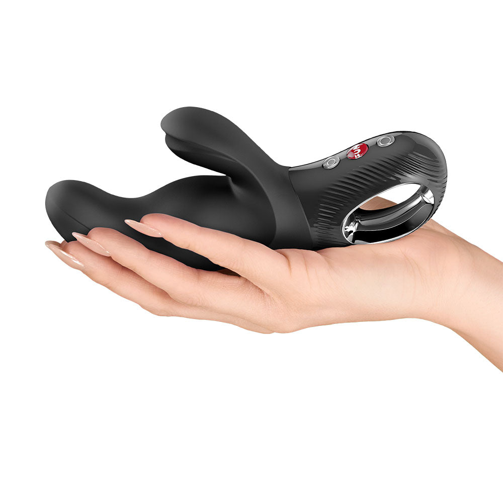 Fun Factory MISS BI  -  17 cm USB-C Rechargeable Vibrator in a hand, showcasing ergonomic design for G-spot stimulation.