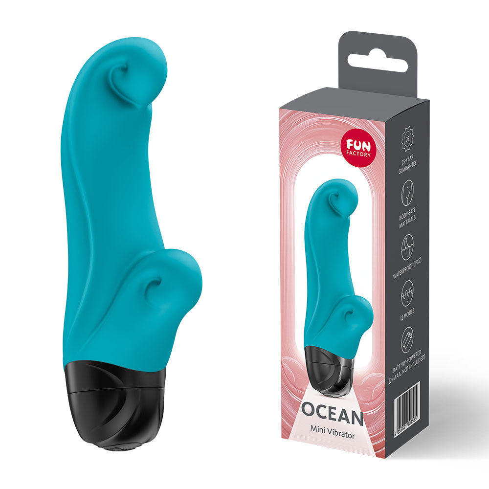 Fun Factory OCEAN Aquamarine - Aquamarine 14.5 cm Vibrator in packaging and displayed, compact design for pleasure.