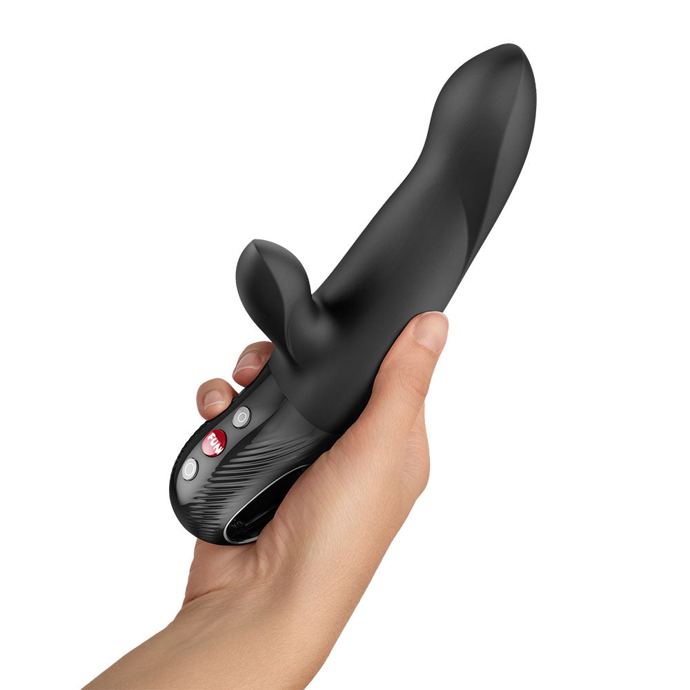 Fun Factory BI STRONIC ARC - 21.6 cm USB-C Rechargeable Thrusting Vibrator held in a hand for intimate pleasure.