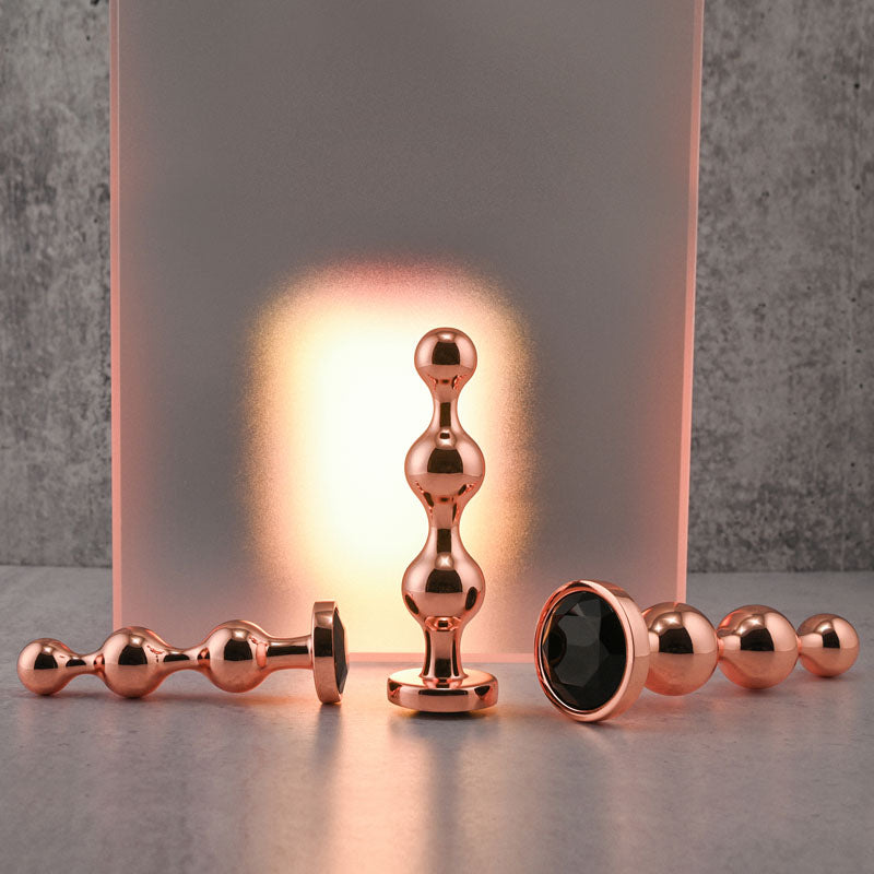 Gender X GOLD DIGGER SET -  Metallic Butt Plugs - Set of 3 Sizes showcasing sleek design and shiny metallic finish.