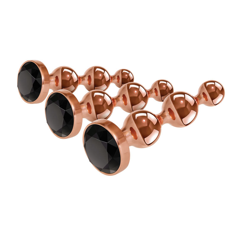 Gender X GOLD DIGGER SET -  Metallic Butt Plugs - Set of 3 Sizes with shiny shafts and sleek black accents.