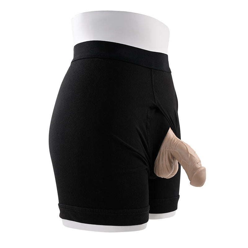 Gender X 4'' SILICONE PACKER LIGHT - 10 cm Packer displayed in black shorts for a realistic look.
