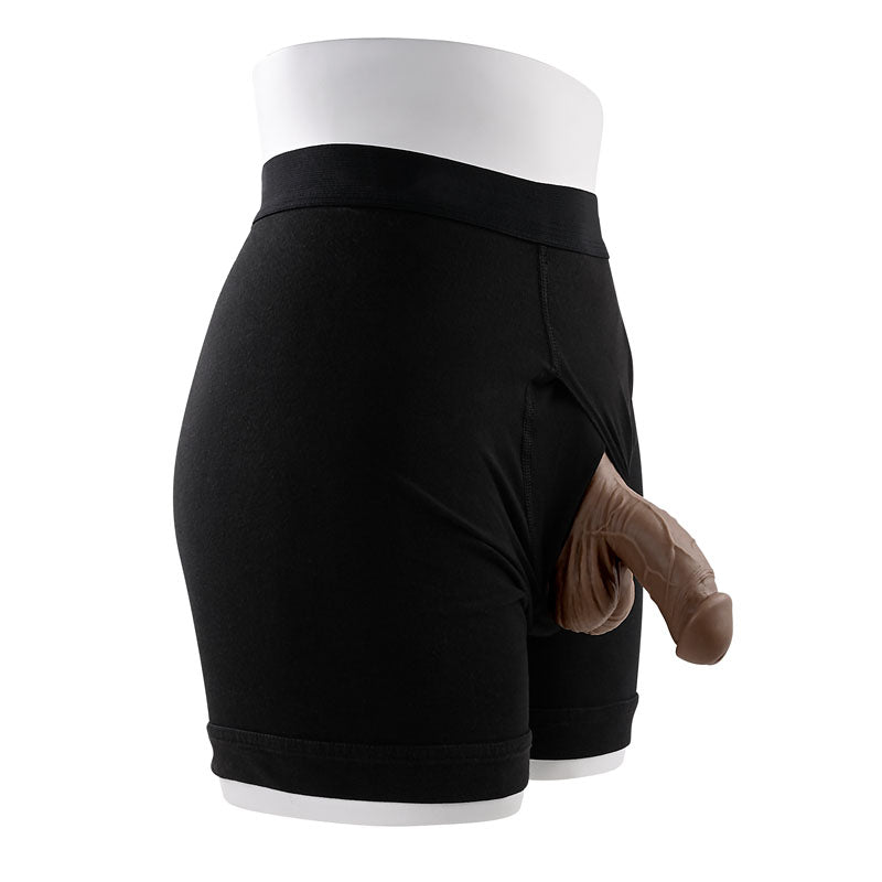 Gender X 4'' SILICONE PACKER DARK -  10 cm Packer displayed in black boxers for realistic effect.