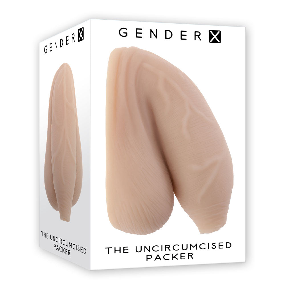 Gender X THE UNCIRCUMCISED PACKER - Light - 11.5 cm Packer packaging featuring realistic details.