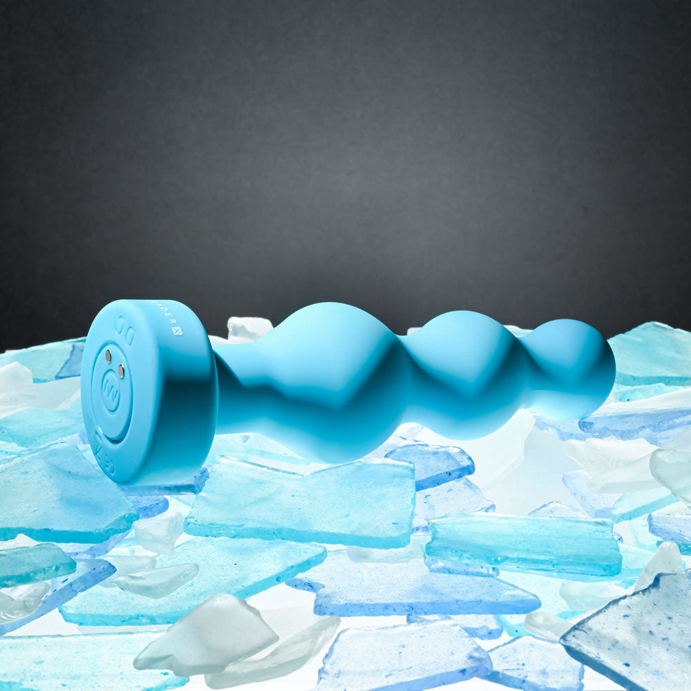 Gender X PLUGGED UP -  13.6 cm USB Rechargeable Butt Plug on ice shards background, showcasing its sleek design.